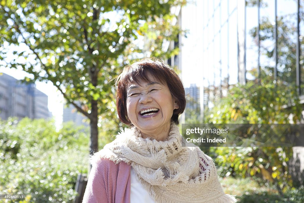 Smiling woman on street