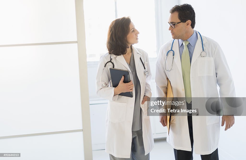 Two doctors talking in hospital, Jersey City, New Jersey, USA