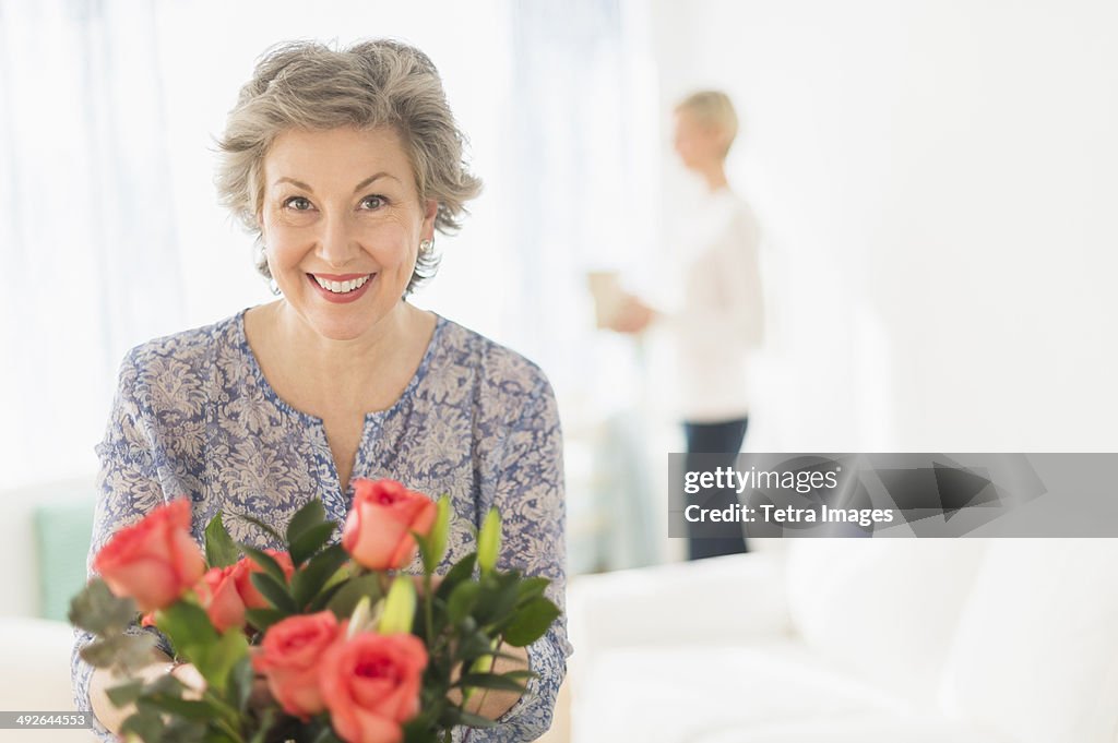 Woman arranging bouquet, Jersey City, New Jersey, USA