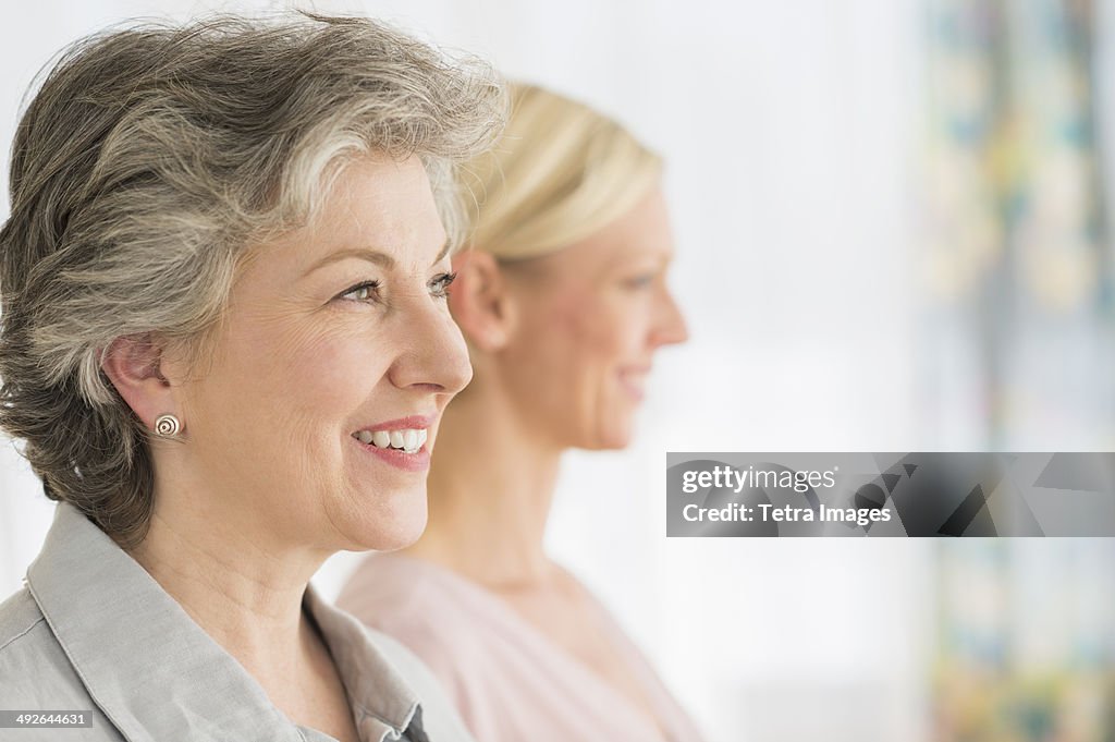 Profiles of two mature women, Jersey City, New Jersey, USA