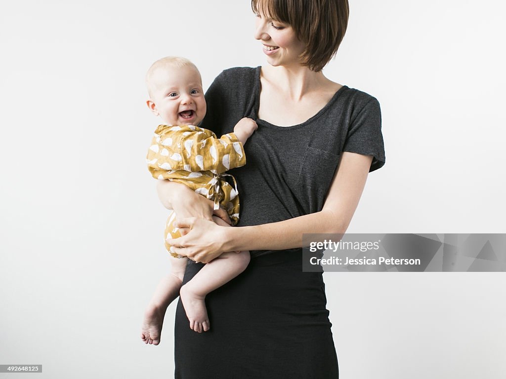 Studio portrait of mother with baby son (2-5 months)