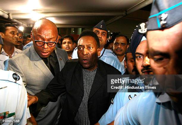 Brazilian football legend Pele arrives at T3 IGI Airport on October 14, 2015 in New Delhi, India. Pele, who turns 75 on October 23, is here on a...