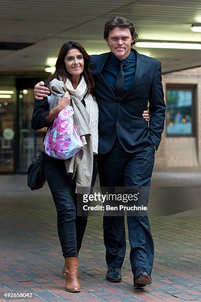 Lou Vincent departs Southwark Crown Court with Susie Vincent after giving evidence in the trial of New Zealand cricketer Chris Cairns on October 14,...