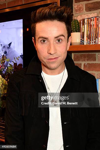 Presenter Nick Grimshaw attends a preview of the Nick Grimshaw x TOPMAN collection at TopShop on October 14, 2015 in London, England.