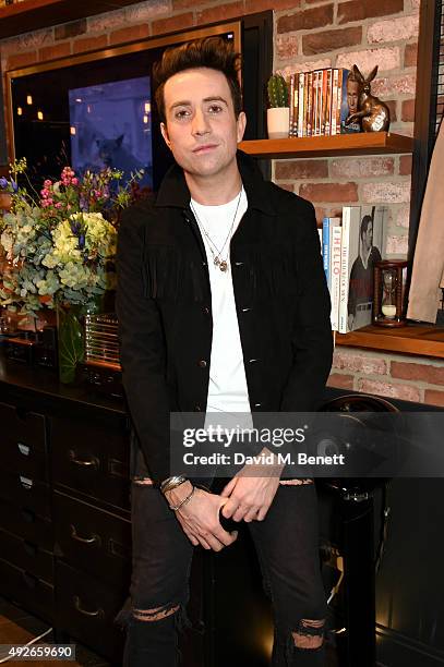 Presenter Nick Grimshaw attends a preview of the Nick Grimshaw x TOPMAN collection at TopShop on October 14, 2015 in London, England.