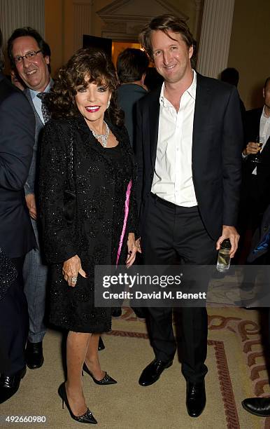 Dame Joan Collins and director Tom Hooper attend The Academy Of Motion Pictures Arts & Sciences new members reception hosted by Ambassador Matthew...