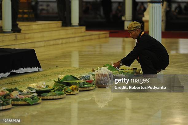 The Royal Kasunanan Surakarta assistants prepares offerings for First Suro Procession to celebrate the 1437th Al-Hijra Islamic New Year eve at...