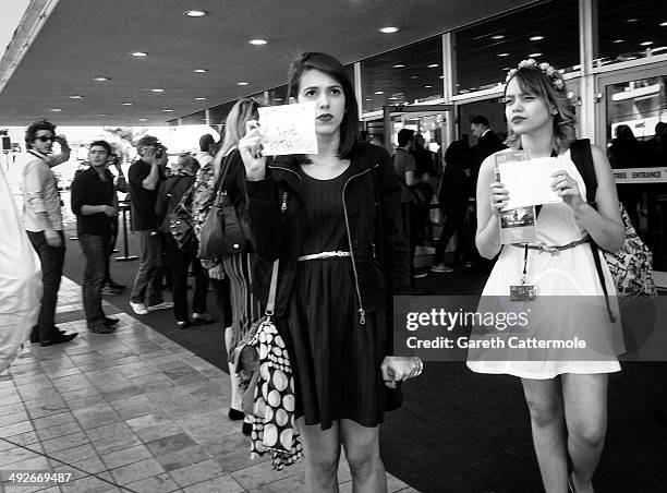 Fans wait for spare tickets during the 67th Annual Cannes Film Festival on May 20, 2014 in Cannes, France.