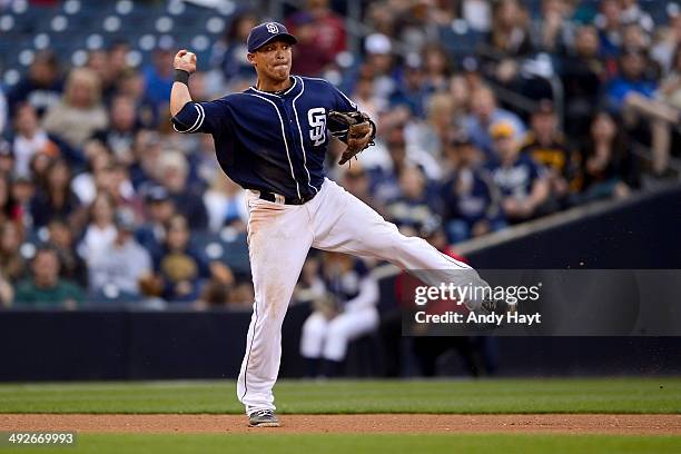 Everth Cabrera of the San Diego Padres throws to first base in the game against the Miami Marlins at Petco Park on May 10, 2014 in San Diego,...