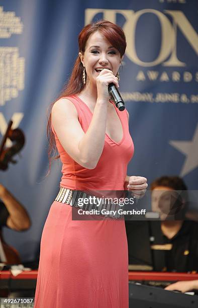 Sierra Boggess of the cast of 'The Phantom of the Opera' performs on stage during 'Stars In The Alley' at Shubert Alley on May 21, 2014 in New York...