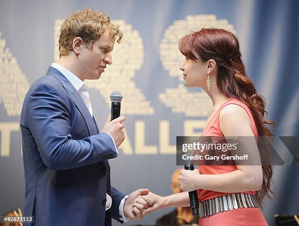 Jeremy Hays and Sierra Boggess of the cast of 'The Phantom of the Opera' perform on stage during 'Stars In The Alley' at Shubert Alley on May 21,...