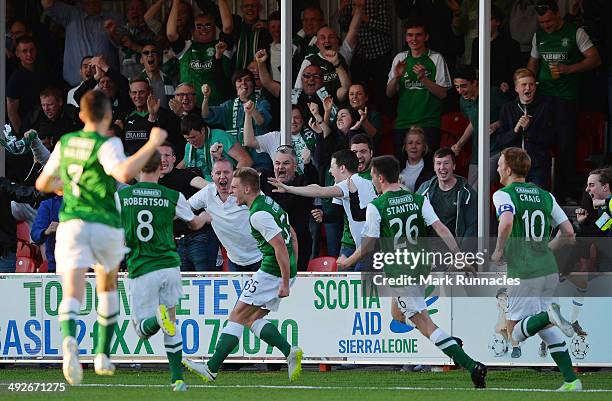 Jason Cummings of Hibernian celebrates scoring the opening goal of the match during the Scottish Premiership Play-off Final First Leg, between...