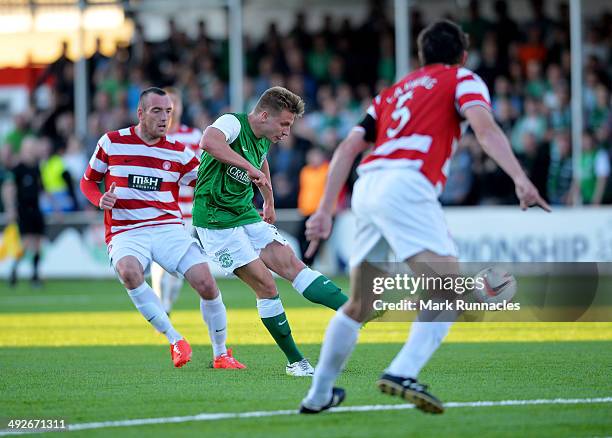 Jason Cummings of Hibernian scores the opening goal of the match during the Scottish Premiership Play-off Final First Leg, between Hamilton...