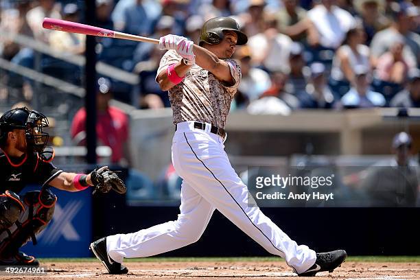 Will Venable of the San Diego Padres hits a home run in the game against the Miami Marlins at Petco Park on May 11, 2014 in San Diego, California.