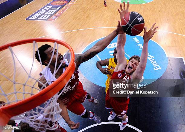 John Bryant of Muenchen fights for the ball during the Beko BBL Playoffs semifinal match between MHP RIESEN Ludwigsburg and FC Bayern Muenchen on May...