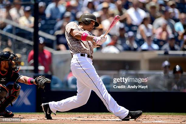 Will Venable of the San Diego Padres hits a home run in the game against the Miami Marlins at Petco Park on May 11, 2014 in San Diego, California.