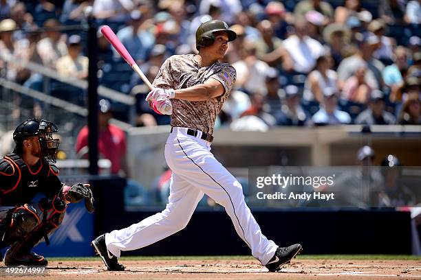 Will Venable of the San Diego Padres hits a home run in the game against the Miami Marlins at Petco Park on May 11, 2014 in San Diego, California.