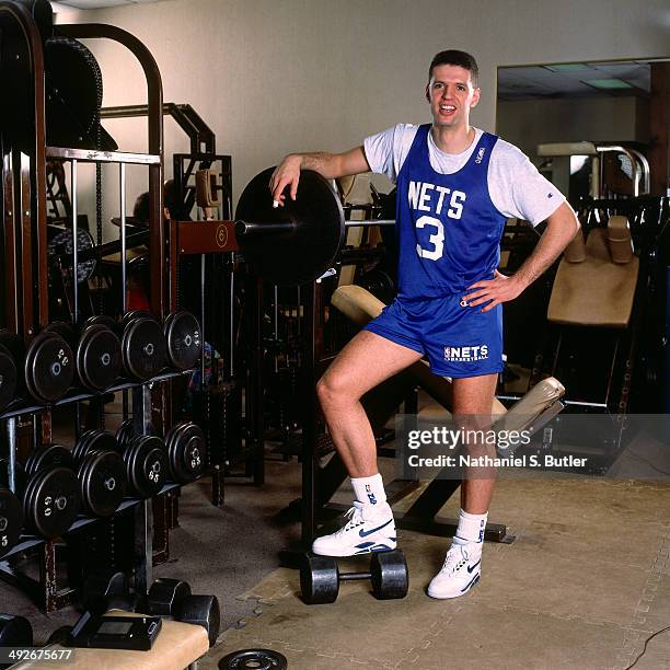 Drazen Petrovic of the New Jersey Nets poses for a photo at his home during an all-access shoot circa 1991 in Hoboken, New Jersey. NOTE TO USER: User...