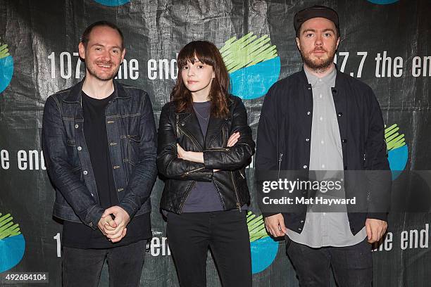 Iain Cook, Lauren Mayberry and Martin Doherty of Chvrches pose for a photo after performing an EndSession hosted by 107.7 The End at Fremont Abbey...