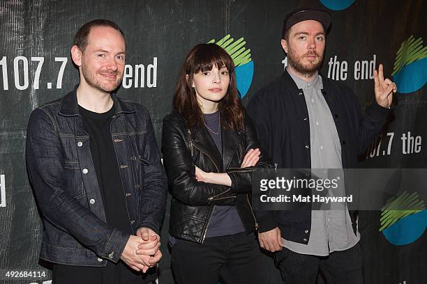 Iain Cook, Lauren Mayberry and Martin Doherty of Chvrches pose for a photo after performing an EndSession hosted by 107.7 The End at Fremont Abbey...