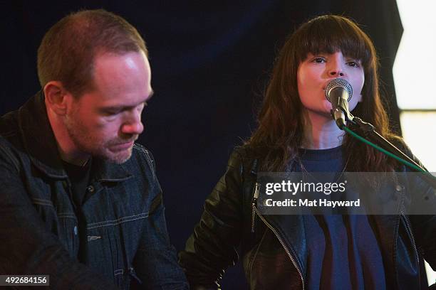 Iain Cook and Lauren Mayberry of Chvrches perform during an EndSession hosted by 107.7 The End at Fremont Abbey Arts Center on October 14, 2015 in...