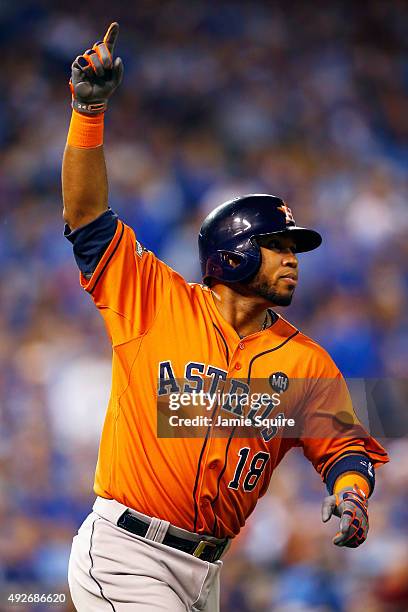 Luis Valbuena of the Houston Astros celebrates after hitting a two-run home run in the second inning against the Kansas City Royals during game five...