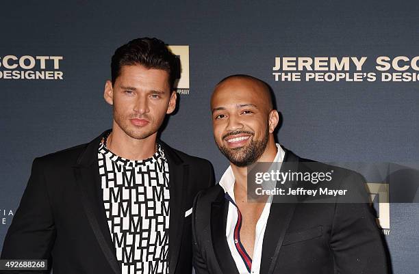 Director/producer Vlad Yudin and producer Edwin Mejia arrive at the Premiere Of The Vladar Company's 'Jeremy Scott: The People's Designer' at TCL...