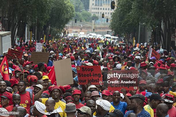 Thousands of members of the NUMSA attend a mass anti corruption march organized by various South African unions and political and civil societies in...