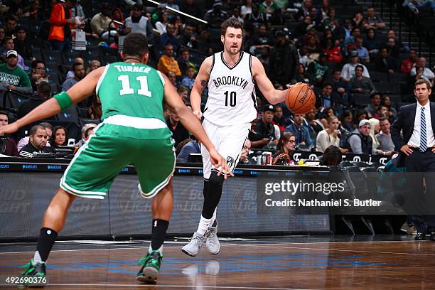 Sergey Karasev of the Brooklyn Nets drives to the basket against the Boston Celtics during the preseason game on October 14, 2015 at Barclays Center...