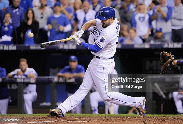 Eric Hosmer of the Kansas City Royals hits an RBI single in the fourth inning against the Houston Astros during game five of the American League...