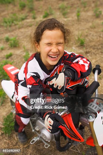 Little Girl Riding Dirt Bike Girl On Motocross Cycle High-Res