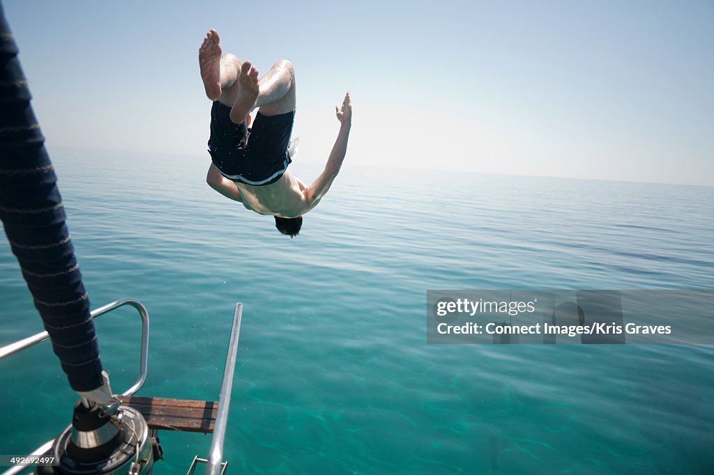 Jump Head First Man Jumping Head First Into The Sea High-Res Stock Photo - Getty Images