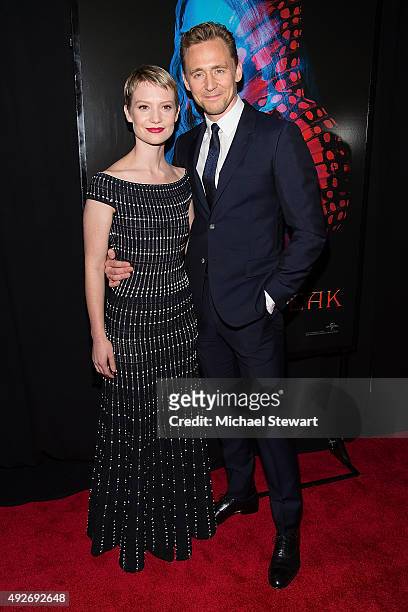 Actors Mia Wasikowska and Tom Hiddleston attend the "Crimson Peak" New York premiere at AMC Loews Lincoln Square on October 14, 2015 in New York City.