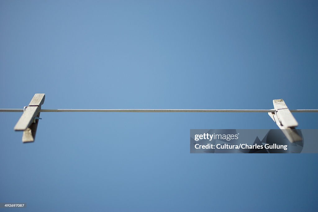 Washing line with two clothes pegs