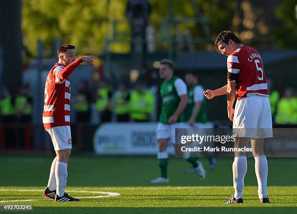 Hamilton players dispute the opening goal by Jason Cummings of Hibernian during the Scottish Premiership Play-off Final First Leg, between Hamilton...