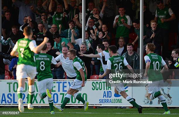 Jason Cummings of Hibernian celebrates scoring the opening goal of the match during the Scottish Premiership Play-off Final First Leg, between...