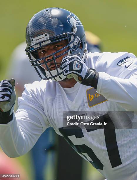 Defensive lineman Jimmy Staten of the Seattle Seahawks defends during Rookie Minicamp at the Virginia Mason Athletic Center on May 17, 2014 in...