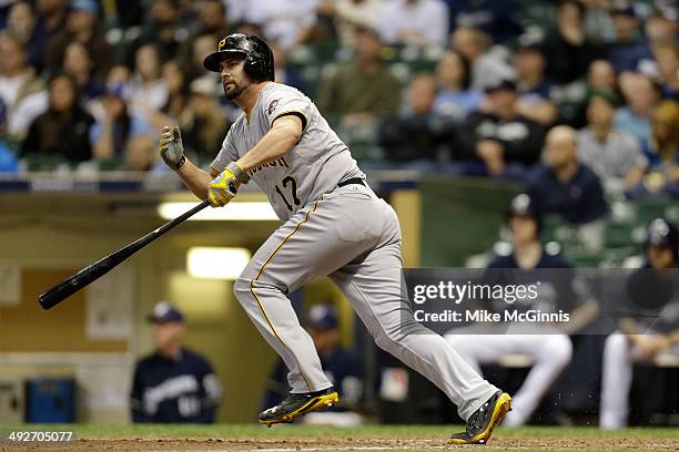 Gaby Sanchez of the Pittsburgh Pirates hits a RBI double in the top of the eighth inning against the Milwaukee Brewers at Miller Park on May 13, 2014...