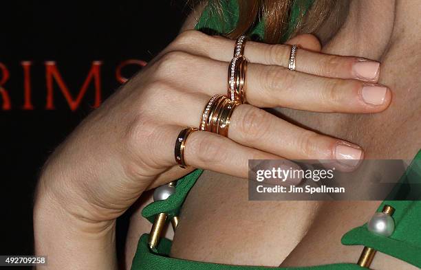 Actress Jessica Chastain, jewelry detail, attends the "Crimson Peak" New York premiere at AMC Loews Lincoln Square on October 14, 2015 in New York...