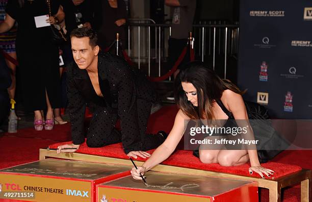 Fashion designer Jeremy Scott and singer Katy Perry at the Jeremy Scott And Katy Perry Hand Print Ceremony At TCL Chinese IMAX Forecourt on September...