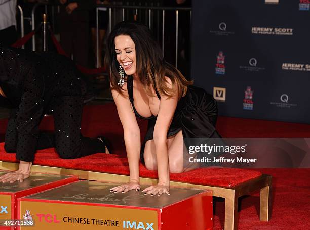 Fashion designer Jeremy Scott and singer Katy Perry at the Jeremy Scott And Katy Perry Hand Print Ceremony At TCL Chinese IMAX Forecourt on September...