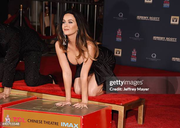 Fashion designer Jeremy Scott and singer Katy Perry at the Jeremy Scott And Katy Perry Hand Print Ceremony At TCL Chinese IMAX Forecourt on September...