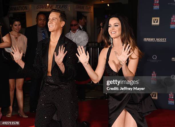 Fashion designer Jeremy Scott and singer Katy Perry at the Jeremy Scott And Katy Perry Hand Print Ceremony At TCL Chinese IMAX Forecourt on September...