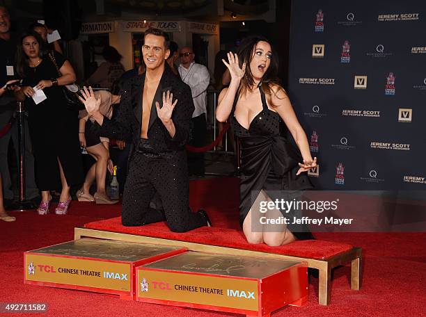 Fashion designer Jeremy Scott and singer Katy Perry at the Jeremy Scott And Katy Perry Hand Print Ceremony At TCL Chinese IMAX Forecourt on September...