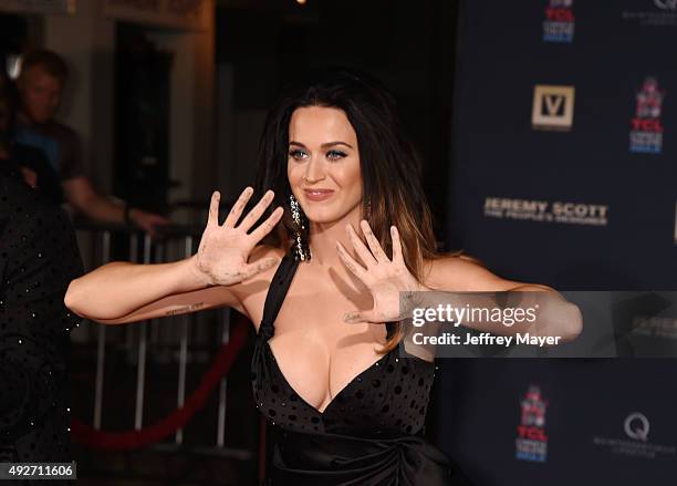 Fashion designer Jeremy Scott and singer Katy Perry at the Jeremy Scott And Katy Perry Hand Print Ceremony At TCL Chinese IMAX Forecourt on September...