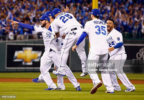 Mike Moustakas of the Kansas City Royals, Kendrys Morales of the Kansas City Royals, Eric Hosmer of the Kansas City Royals, and Christian Colon of...