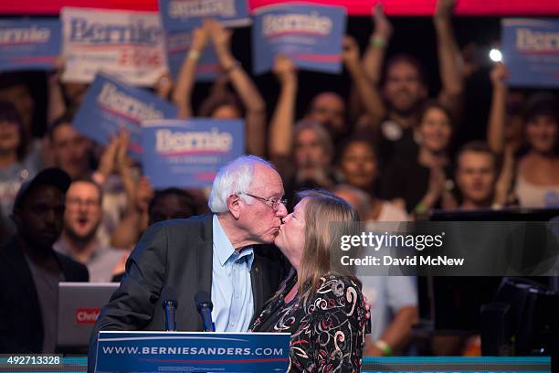 Democratic presidential candidate Sen. Bernie Sanders kisses his wife, Dr. Jane O'Meara Sanders, at a campaign fundraising reception at the Avalon...