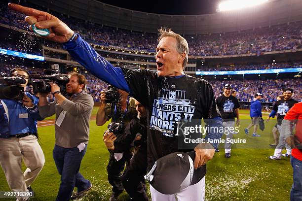 Manager Ned Yost of the Kansas City Royals celebrates after the Kansas City Royals defeat the Houston Astros 7-2 in game five of the American League...