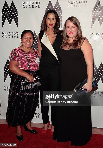 Delia Mendoza, Padma Lakshmi and Ruth DeGolia attend the 2015 Mercado Global Fashion Forward Gala at The Bowery Hotel on October 14, 2015 in New York...