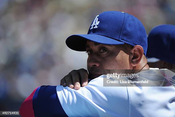 Miguel Olivo of the Los Angeles Dodgers looks on during the game against the San Francisco Giants at Dodger Stadium on May 11, 2014 in Los Angeles,...